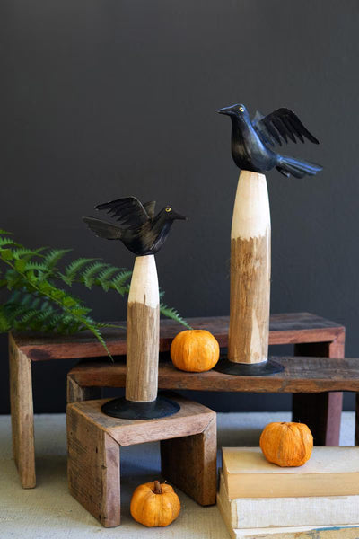 SET OF TWO BLACK IRON CROWS ON WOODEN BASES — Kalalou NBA2482
