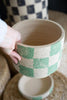 SET OF THREE CHECKERED CLAY PLANTERS WITH TRAYS — Kalalou H4427