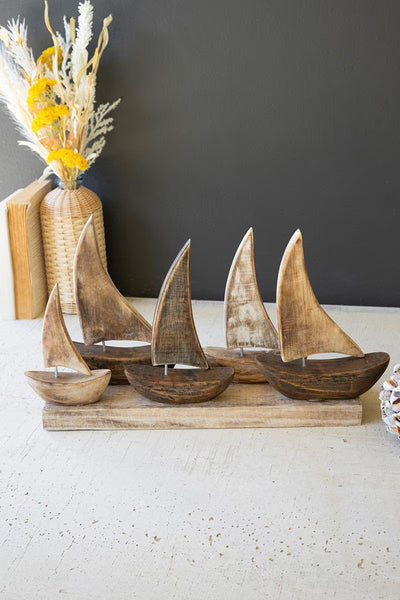 FIVE WOODEN SAIL BOATS ON A BASE — Kalalou DRA1034