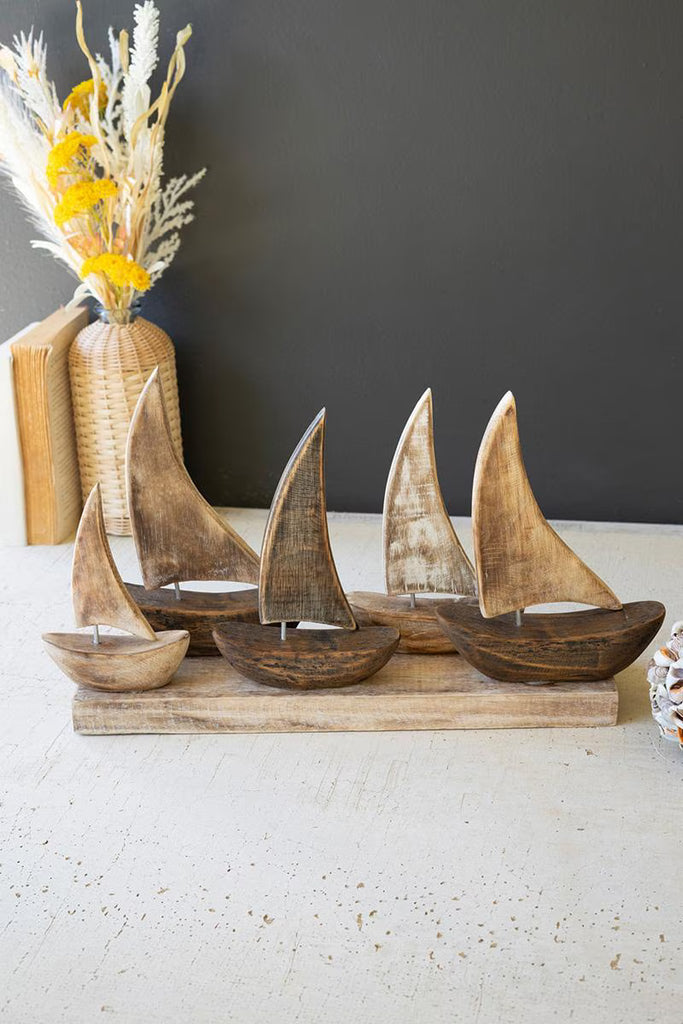 FIVE WOODEN SAIL BOATS ON A BASE — Kalalou DRA1034
