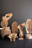 CARVED TEAK WOOD SCUPLTURE ON A BASE - PERFORATED — Kalalou DRA1008