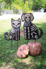 Set of 2 Hand-Hammered Painted Metal Cat and Dog Skeleton Yard Stakes