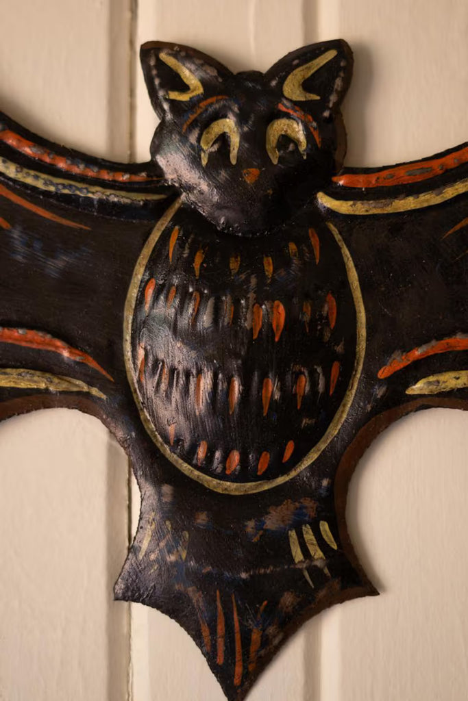 Hand-Hammered Painted Metal Bat with Happy Haunting Sign Wall Hanging