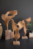 Smooth Hand-Carved Teak Wood Sculpture on a Base