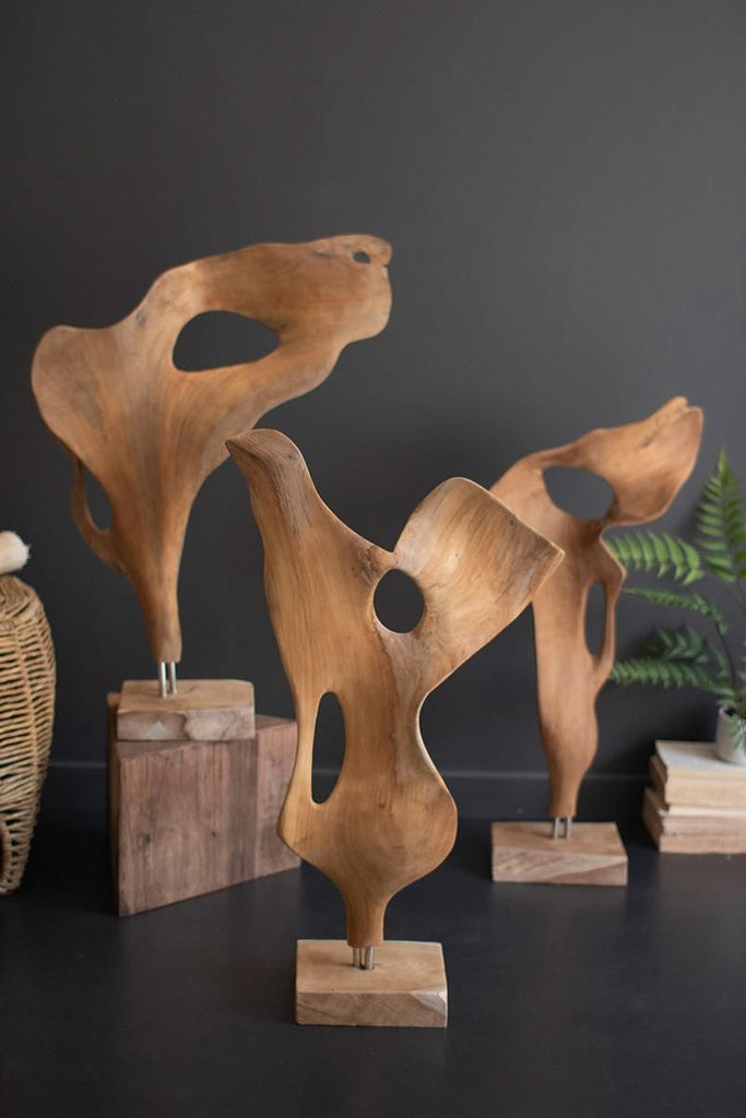 Smooth Hand-Carved Teak Wood Sculpture on a Base
